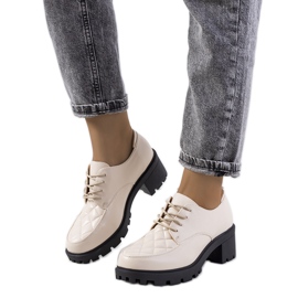 Béžové boty na podpatku značky Landra béžový Béžové boty na podpatku značky Landra béžový