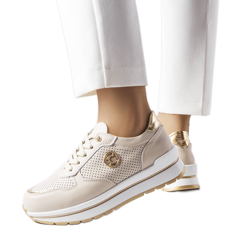 Béžové prolamované kožené boty od Talbot béžový