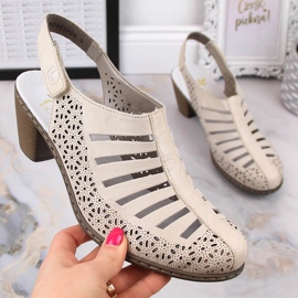 Béžové kožené sandály na vysokém podpatku Rieker 40959-60 béžový