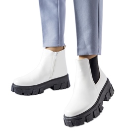 Masivní bílo-černé kotníkové boty Petronio bílý Masivní bílo-černé kotníkové boty Petronio bílý