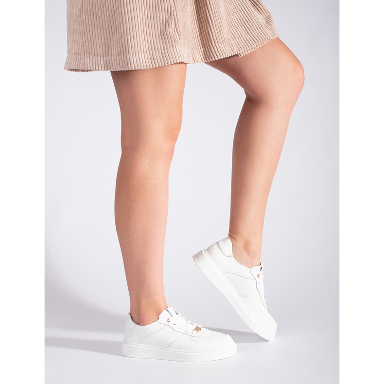 Bílé dámské kožené sportovní boty bílý 1