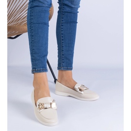 Béžové mokasíny zdobené lukem a zlatým medvídkem béžový 1