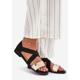 EVento Ploché ženské sandály s flexibilními černými a zlatými pruhy černá 1 EVento Ploché ženské sandály s flexibilními černými a zlatými pruhy černá 1