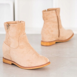 Sergio Todzi Elegantní klínové kozačky béžový 1