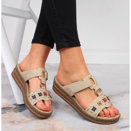 Dámské béžové pantofle na klínku Rieker 62924-60 béžový 1