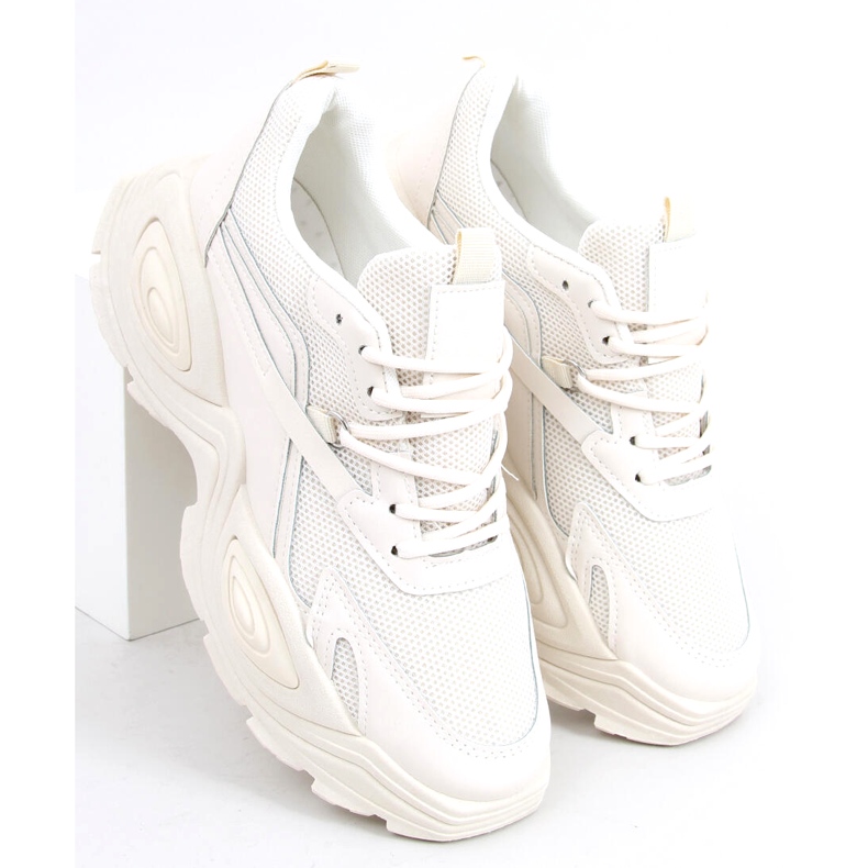 Béžová dámská sportovní obuv s vysokou podrážkou béžový 2